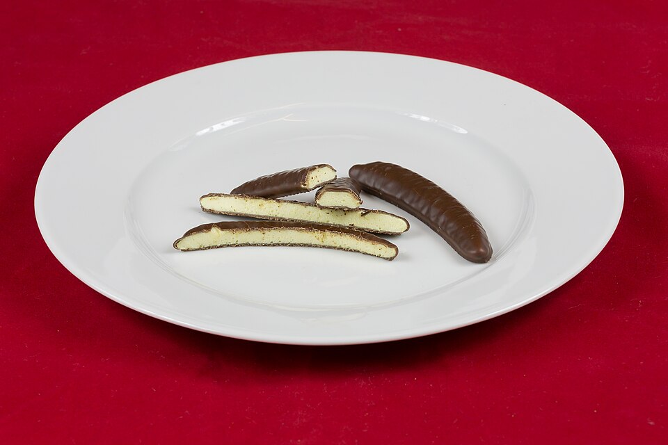Chocolate frozen banana with choice of toppings